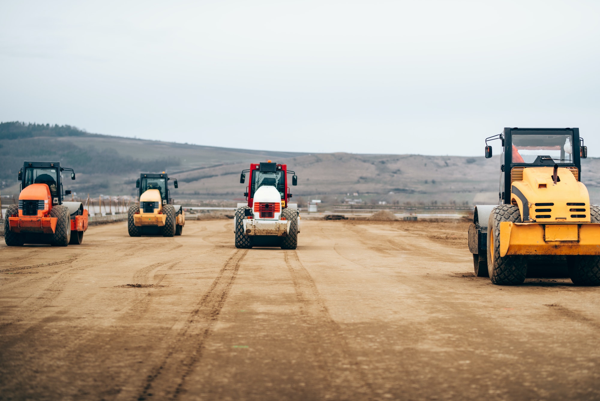 Vibratory Compactor during road and highway construction. Vibratory Compactor during road and highway construction.